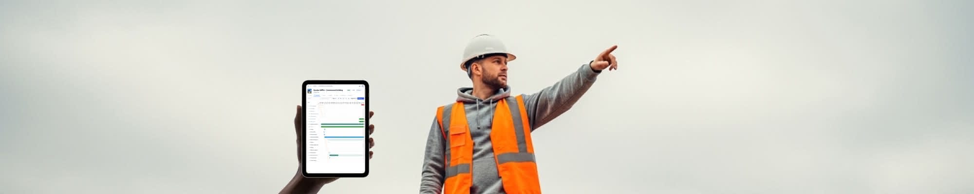 Crew reviewing project plans on a jobsite