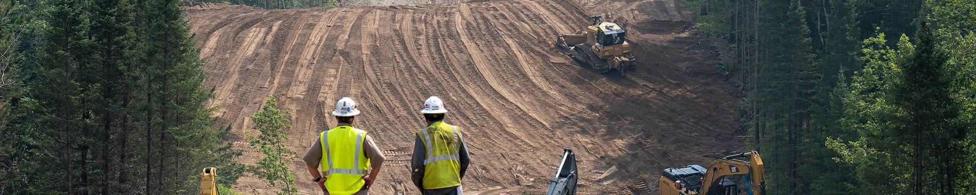 Pipe laid out across a construction site